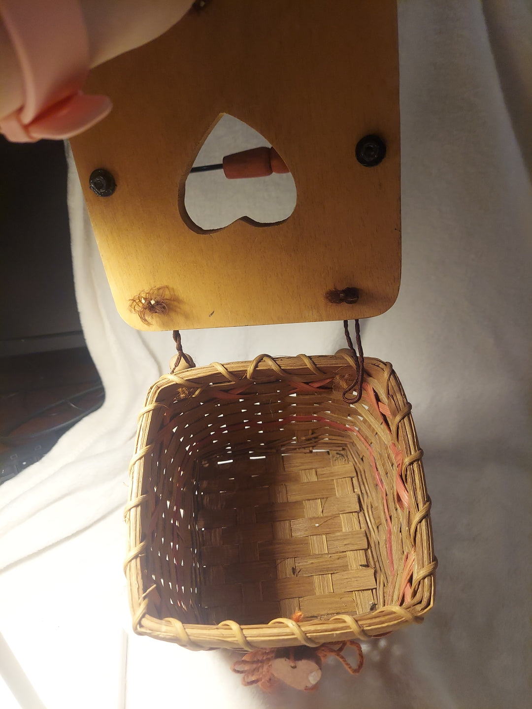 Vintage wicker tissue box with wooden lid and red accents