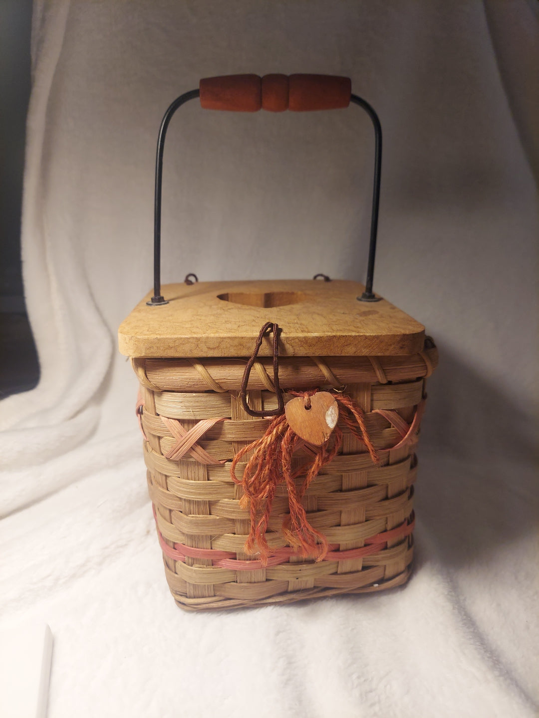 Vintage wicker tissue box with wooden lid and red accents