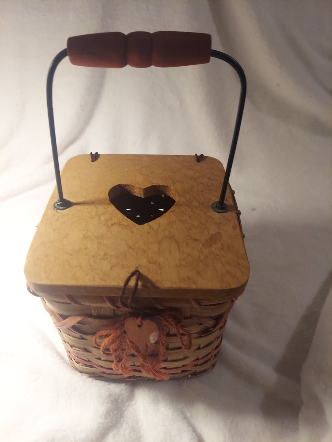 Vintage wicker tissue box with wooden lid and red accents